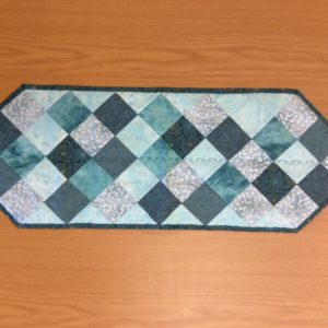 teal quilted table runner