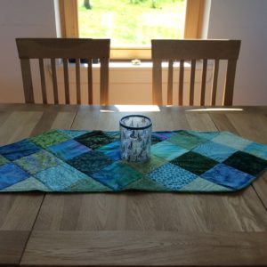 green and blue batik table runner