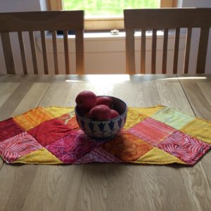 red yellow batik table runner