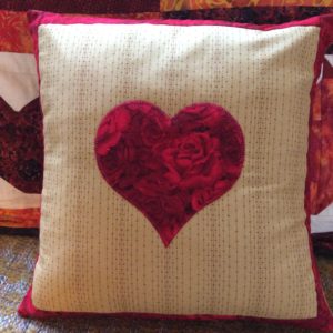 single red heart cushion